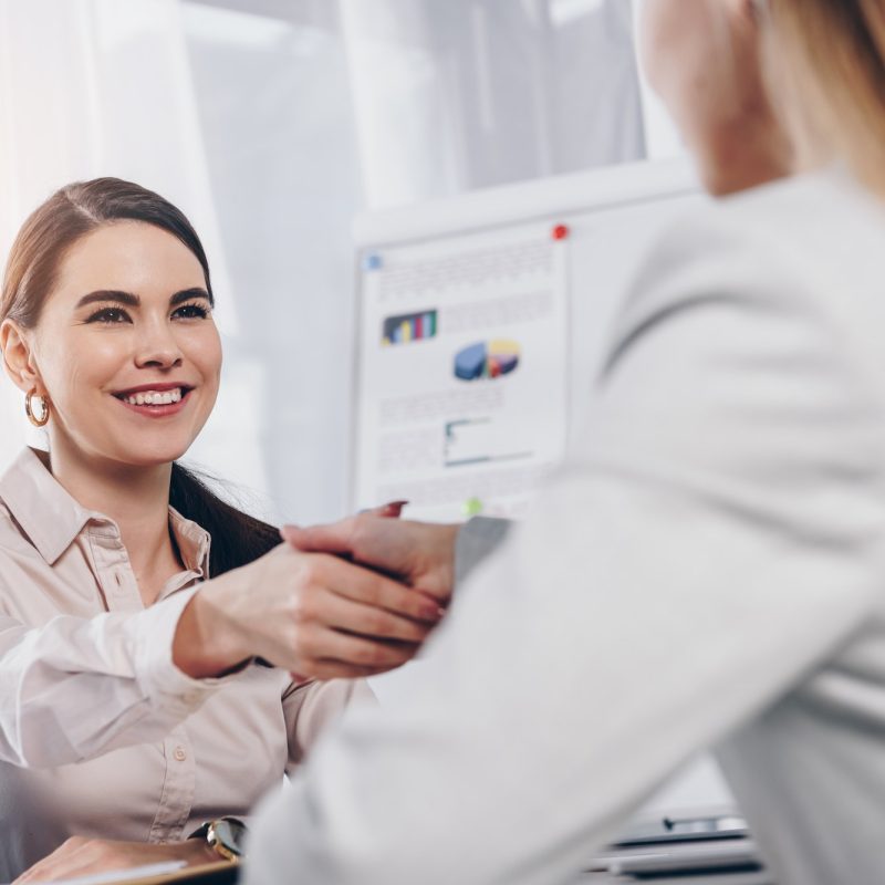 recruiter-smiling-and-shaking-hands-with-employee-at-job-interview-in-office.jpg recruiter-smiling-and-shaking-hands-with-employee-at-job-interview-in-office.jpg